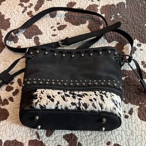 Western style Studded Black and White faux cowhide Crossbody Bag.